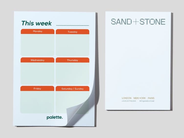 Two customized MOO Notepads placed next to each other.