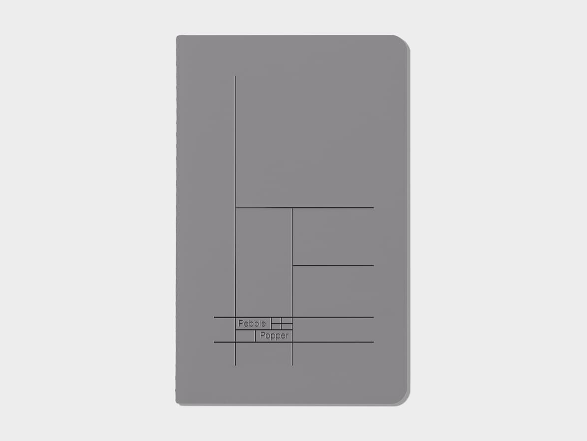 Charcoal grey soft cover journal with black foil pattern